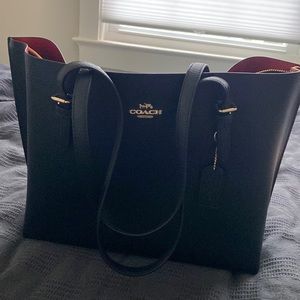 Coach black Mollie tote with red interior